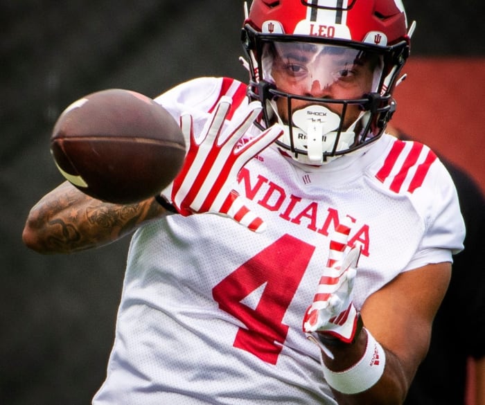 Indiana wide receiver DeQuece Carter catching a pass at fall camp practice in Bloomington.